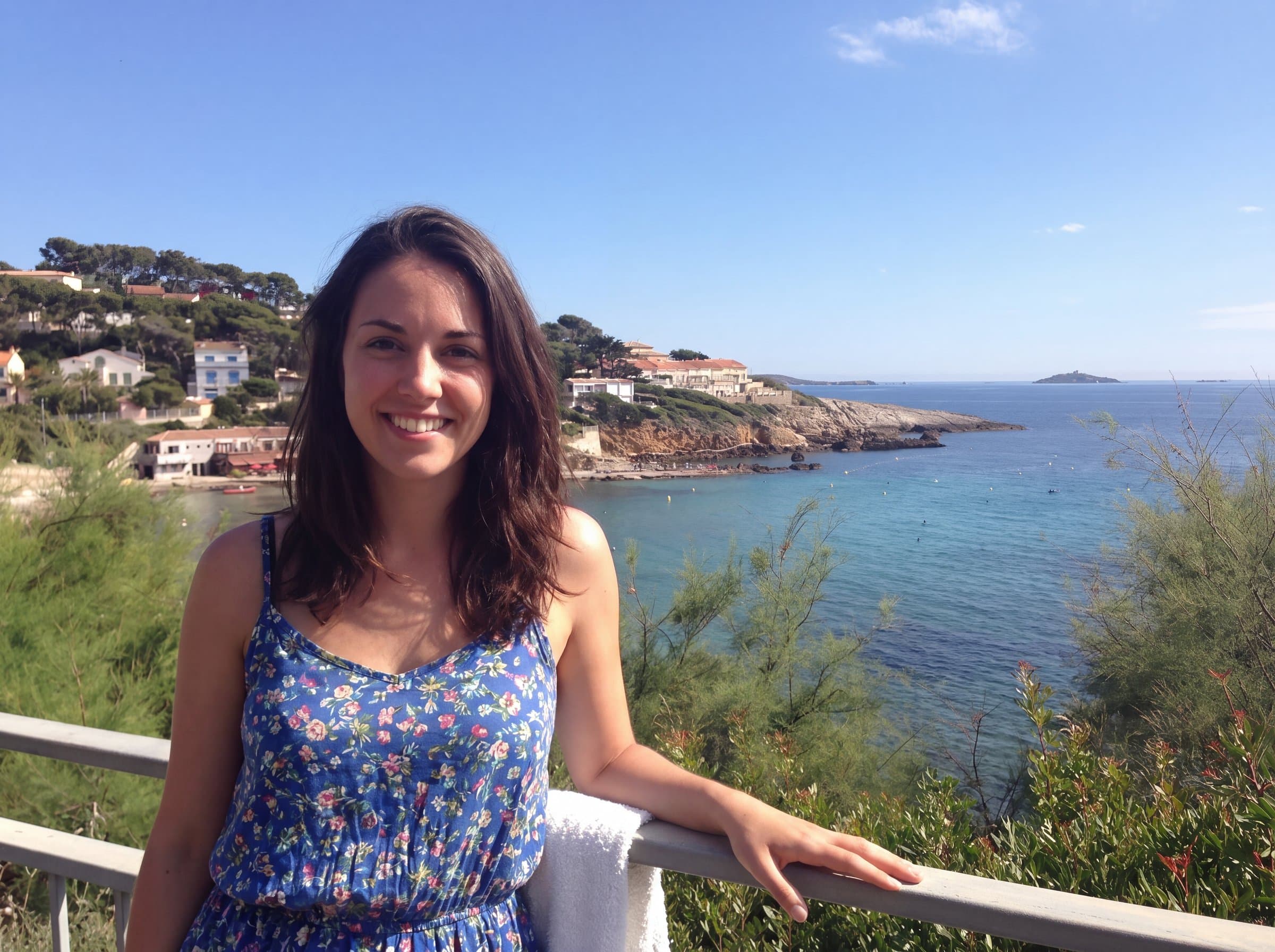 Photo of a woman on a coastal balcony used for the style samples